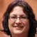 Margaret Collins — satisfied with fresh assorted nuts and festive gift tray